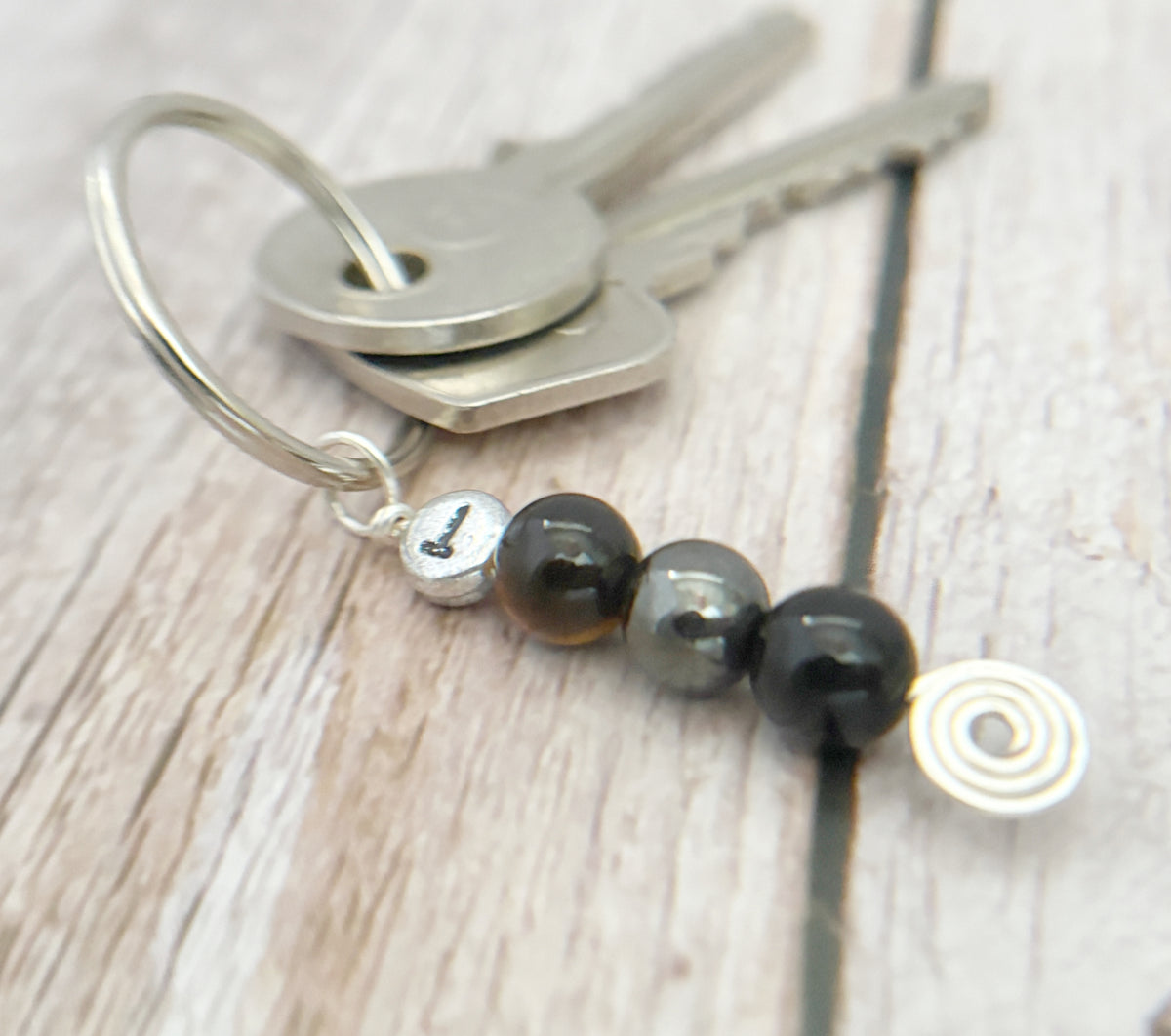 Still Waters Keychain | Deflect Crystal Emotional Gifts | Strength Within